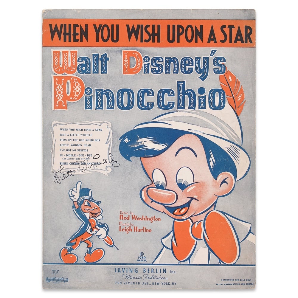 WALT DISNEY SIGNED "PINOCCHIO" SHEET MUSIC - "WHEN YOU WISH UPON A STAR" (1939): 11 7/8 x 9 1/8 in (30.2 x 23 cm) Provenance and Authentication: According to the Letter of Authenticity (LOA) and Certificate of Authenticity (COA) provided by the consignor, this collectible was