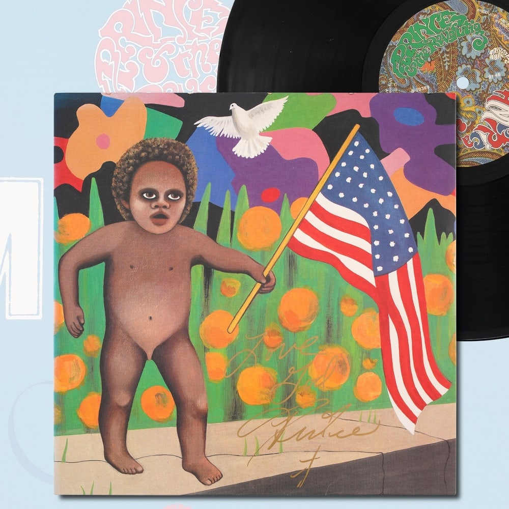 PRINCE SIGNED "AMERICA" LP: 12 1/4 x 12 1/4 in Provenance and Authentication: According to the Letter of Authenticity (LOA) and Certificate of Authenticity (COA) provided by the consignor, this collectible was subjected to a