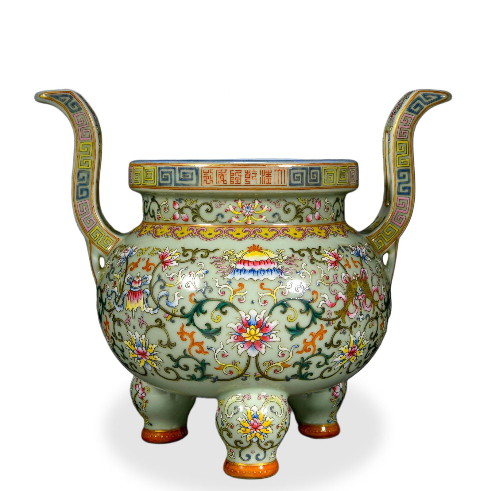 QIANLONG FAMILLE ROSE 'EIGHT BUDDHIST TREASURES' TRIPOD CENSER ON CELADON GROUND