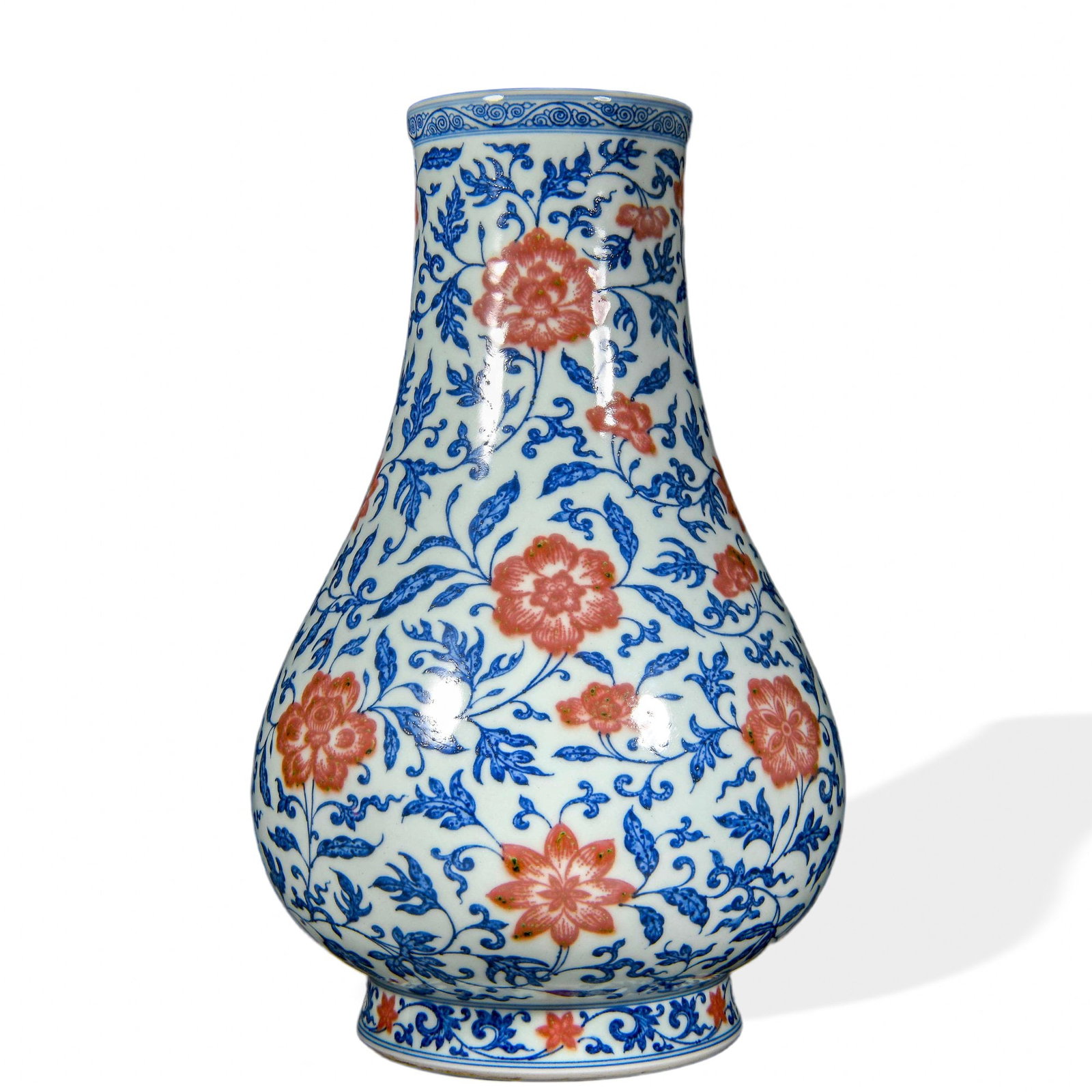 YONGZHENG UNDERGLAZE BLUE AND COPPER-RED 'LOTUS AND PEONY SCROLL' WIDE-MOUTHED VASE