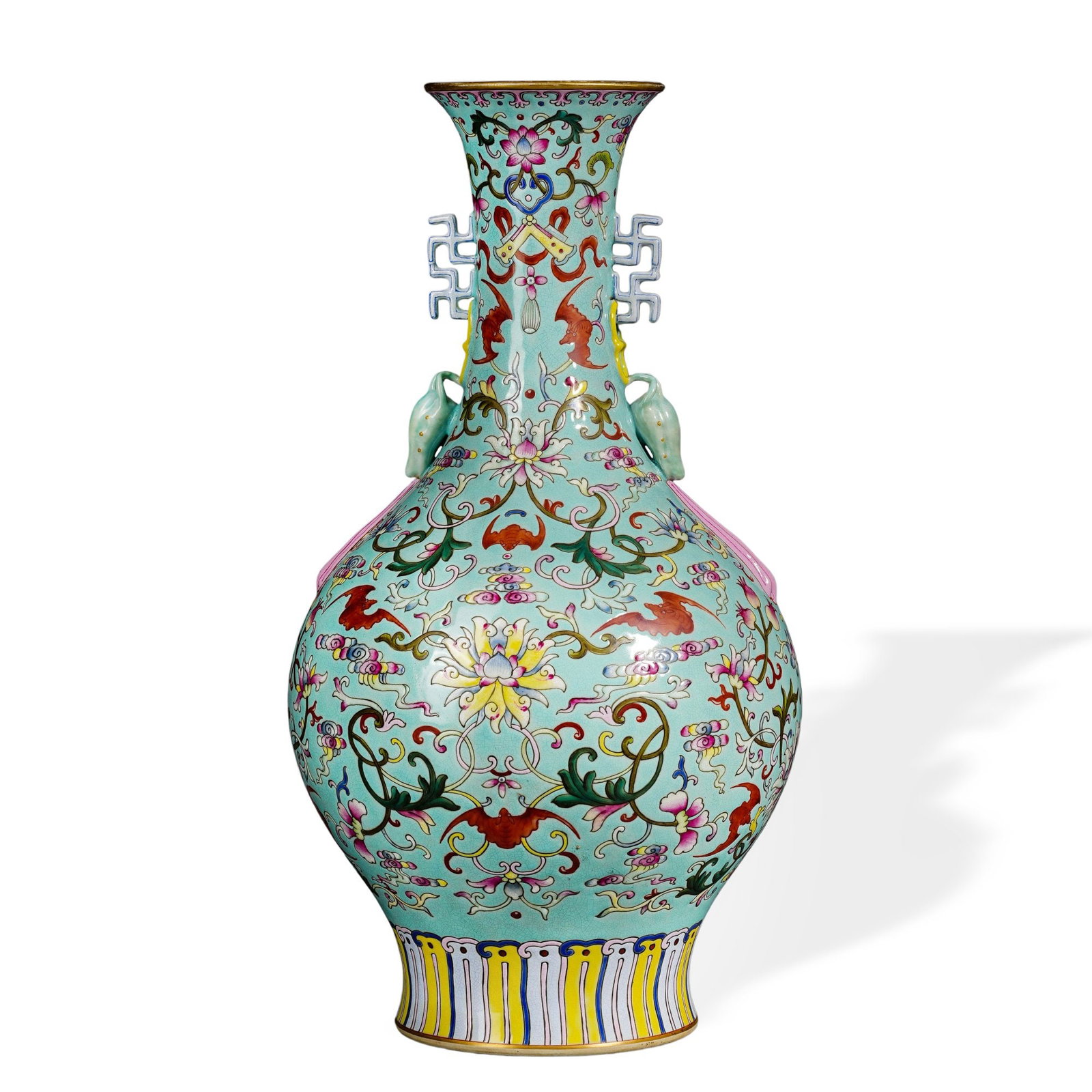 QIANLONG FAMILLE ROSE 'WESTERN LOTUS' TWIN-HANDLED ZUN VASE ON GREEN GROUND (1 of 6)
