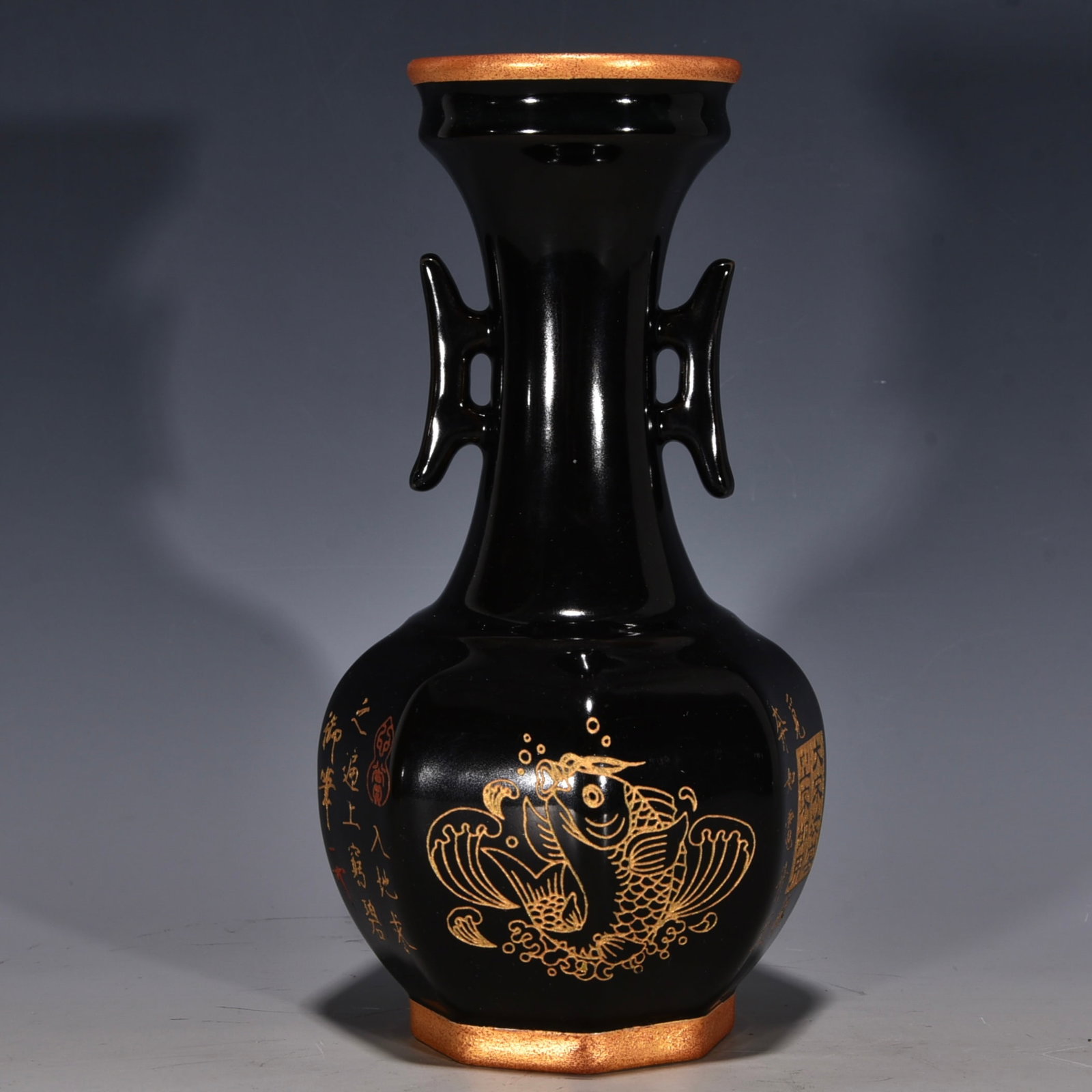 Song Dynasty Ru ware black-glazed vase with gilt inscription and engraved fish design on the rim.: A Song Dynasty Ru ware black-glazed vase with a rimmed mouth, gilded inscription, and engraved fish design, with two handles, 23.5 cm high and 12 cm in diameter. Thank you for viewing our auction and 