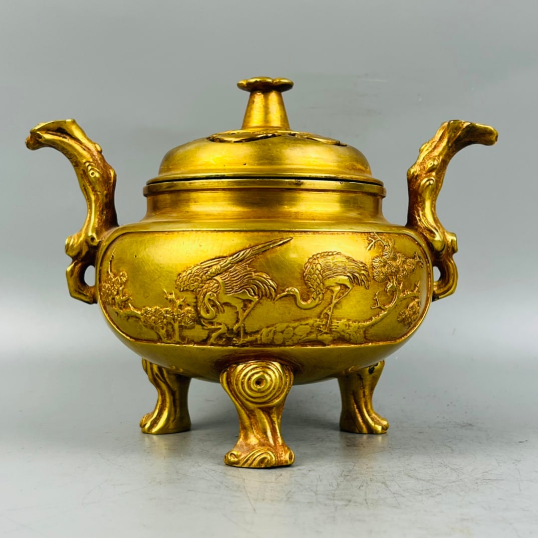Formerly owned gilt bronze three-legged double-eared incense burner (1 of 6)