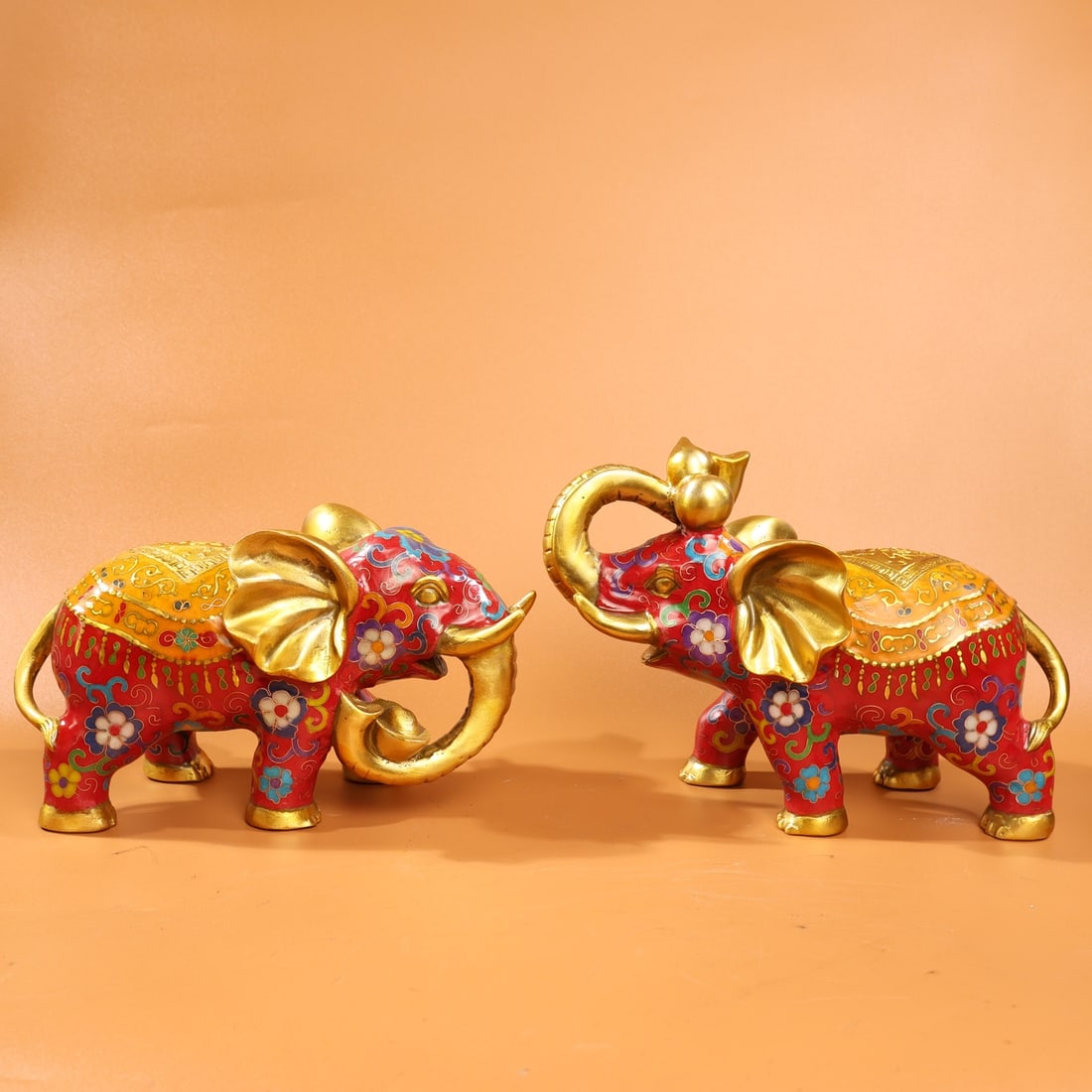 Collector's item: Pure copper gilt cloisonne elephant symbolizing wealth and fortune.: This is a rare, pure copper gilt cloisonne elephant figurine, handcrafted with filigree enamel. The figurine is well-proportioned, with a peaceful and prosperous design, and exquisite craftsmanship. T