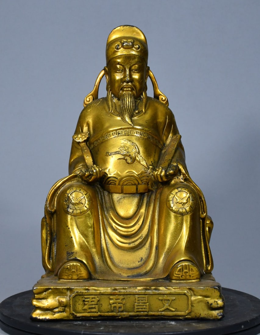 Gilded Brass Wenchang Emperor: This gilt brass statue of Wenchang Dijun is thick and heavy, meticulously cast, with an elegant color and a thick, antique patina, exuding a natural and dignified charm. The entire statue is deeply an