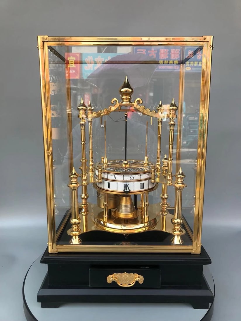 Porcelain Plate Gilded Copper Clock: This porcelain plate clock with pure copper gilt decoration is exquisitely crafted, perfectly preserved, and beautiful. Ideal for living room or office display, it exudes elegance and sophistication,