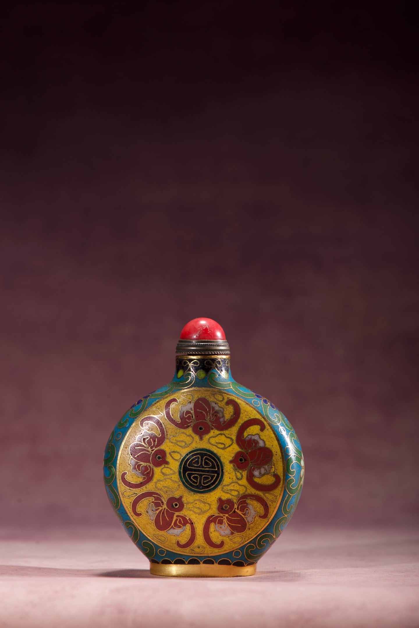 Cloisonne Enamel Five Blessings and Longevity Snuff Bottle: A copper cloisonne enamel snuff bottle with five auspicious symbols and longevity symbols. It is 78mm high, 62mm wide, and 29mm thick, and weighs 80g. Thank you for viewing our auction and we look for