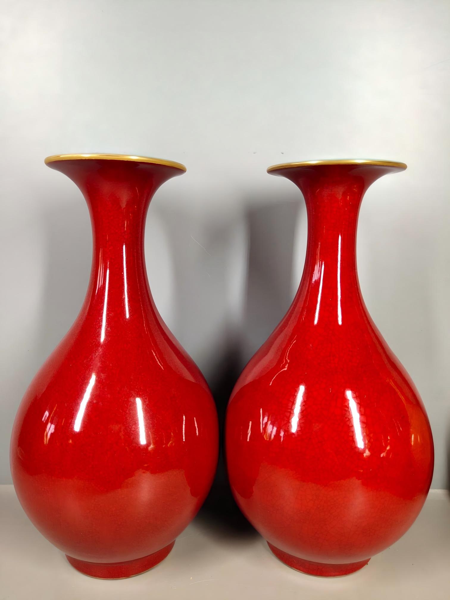 A monochrome lacquered vase with a gold-rimmed mouth made during the Qianlong reign.: A pair of rare, monochrome, crackled-glaze, gold-rimmed vases made during the Qianlong reign. Thank you for viewing our auction and we look forward to serving you as a valued customer!