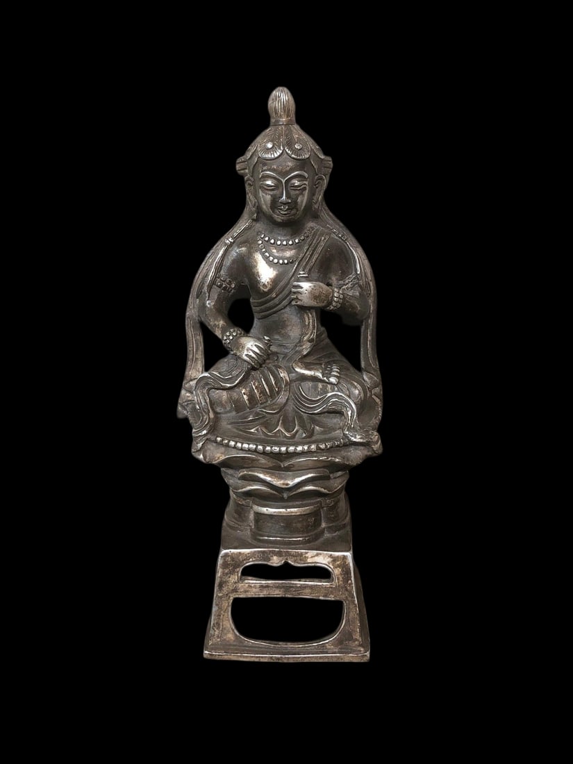 High-relief statue of Palden Lhamo in white bronze with silver gilding: A white bronze gilt silver high-relief statue of the auspicious goddess, with a rich patina, perfect condition, and a grand design. It measures 9.5cm in length, 8.5cm in width, and 24cm in height.