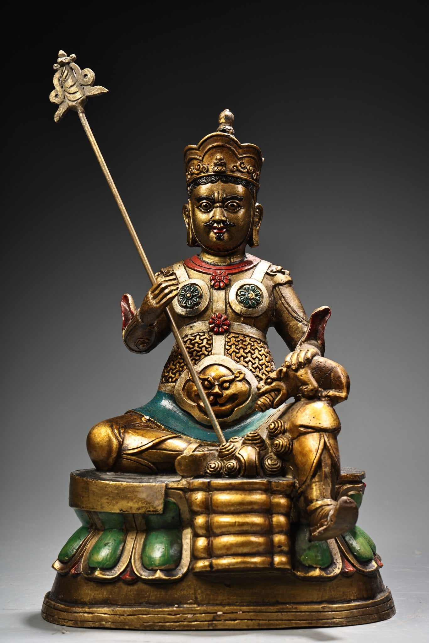 Rare antique collection: a pure copper, high-relief, engraved, painted, and gilded Tibetan Buddhist: A rare and exquisite piece from a long-time collection: a pure copper, high-relief, engraved, painted, and gilded Tibetan Buddhist statue of the Wealth King. The statue is exquisitely crafted, weighs 