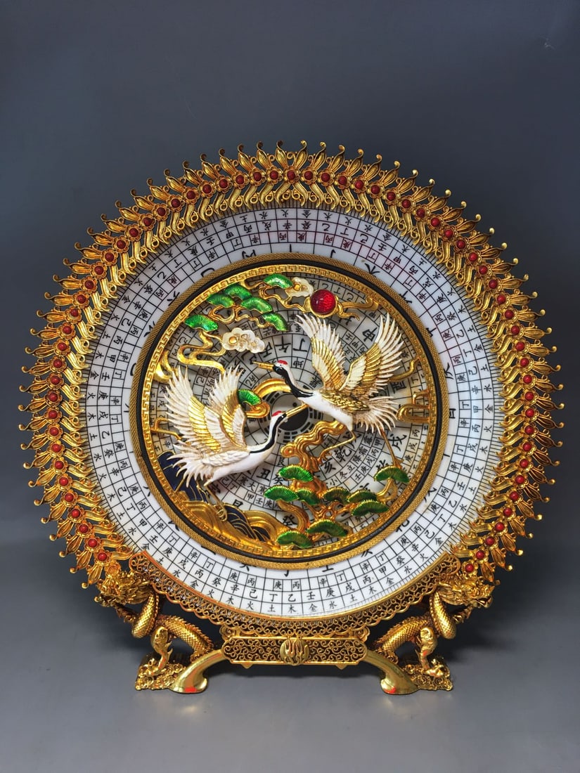 A Qing Dynasty silver-gilt Bagua plate inlaid with pine and crane ornaments (1 of 8)