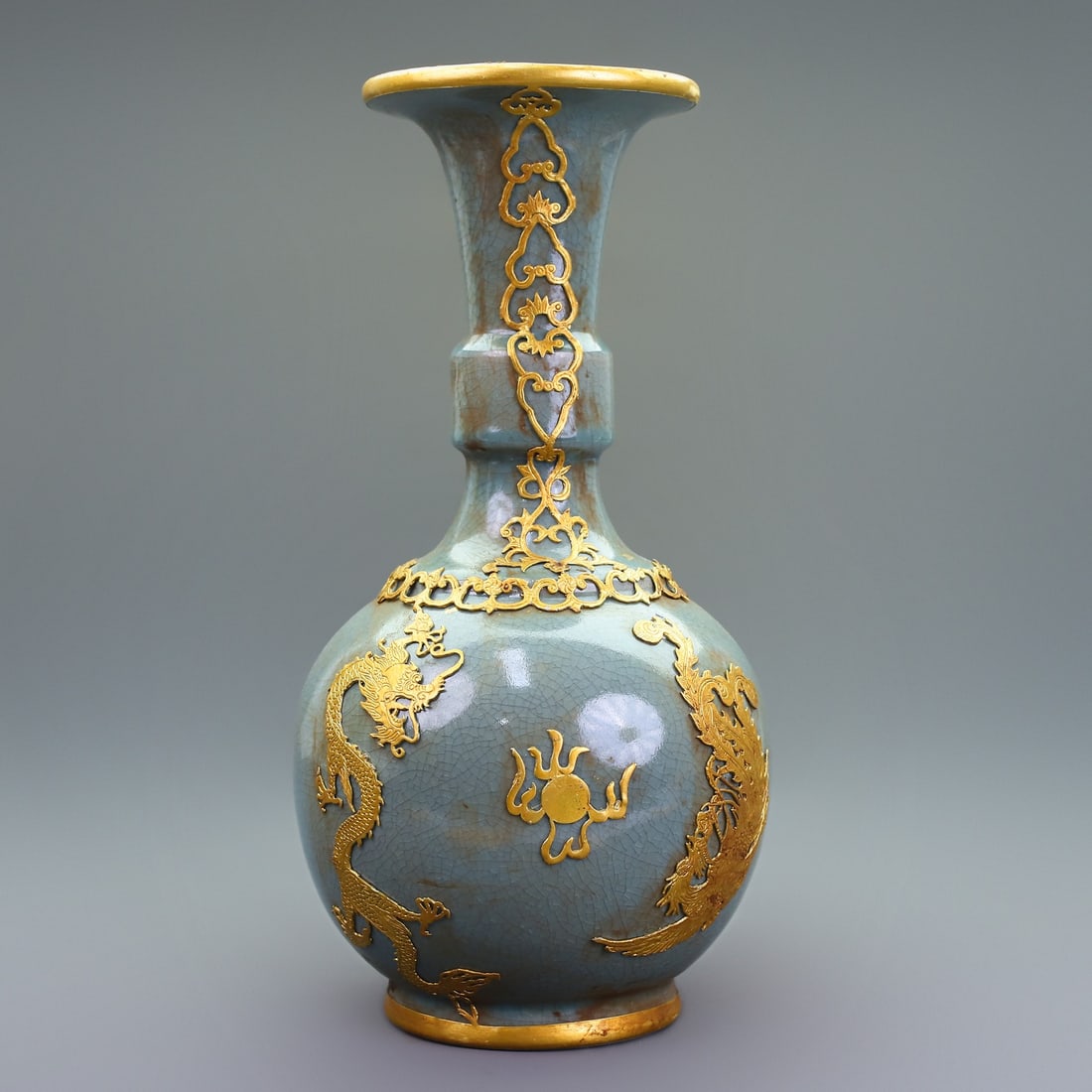 Treasured Collection of Gold-Plated Ru Ware Dragon and Phoenix Vase: A rare, gilded Ru ware porcelain vase with dragon and phoenix design, exquisitely crafted and uniquely made. It exudes elegance and sophistication. Weight: 1600g, Height: 32cm, Width: 167cm. Thank you