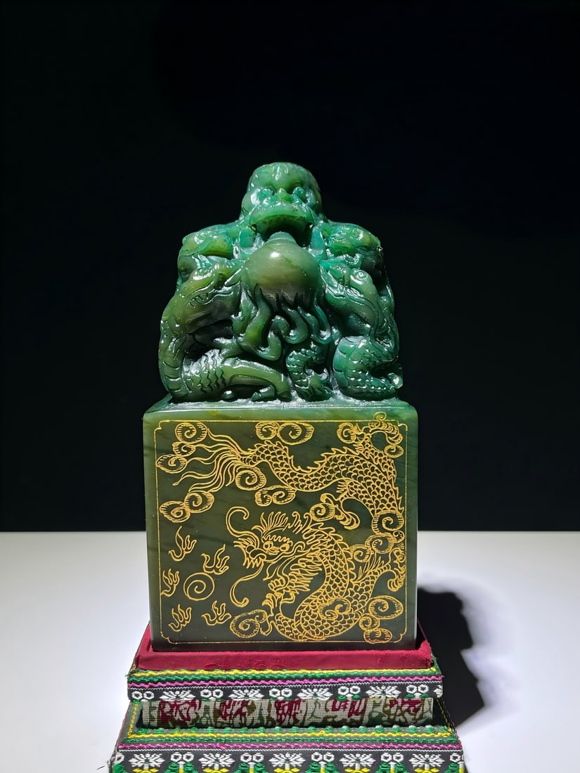 A fine old collection of green and yellow stone seals with five dragons attracting pearls. (1 of 9)
