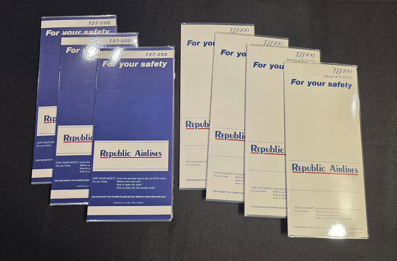 Republic Airlines Safety Cards: Seven Republic Airlines safety cards from 1985. Three Boeing 727-200 (August) and four B727-200 (Aircraft 731/732/733).25% of all proceeds from the sale of this lot will be donated to the Raise Your