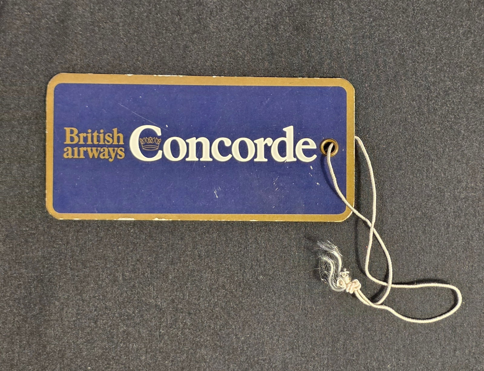British Airways Concorde Luggage Tag: Vintage British Airways Concorde Luggage Tag from the 1980/90s. 50% of all proceeds from the sale of this lot will be donated to the Raise Your Banner Foundation, a Washington DC based non-profit
