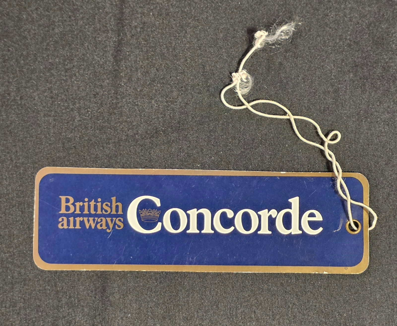 British Airways Concorde Luggage Tag: Vintage British Airways Concorde Luggage Tag from the 1980/90s. 50% of all proceeds from the sale of this lot will be donated to the Raise Your Banner Foundation, a Washington DC based non-profit