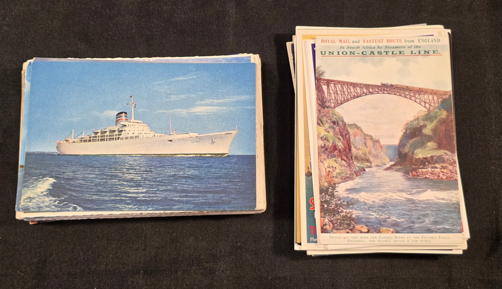 Union Castle Line Post Cards: 76 total. Mix of Union Castle Line ships color postcards. 50% of all proceeds from the sale of this lot will be donated to the Raise Your Banner Foundation, a Washington DC based non-profit whose