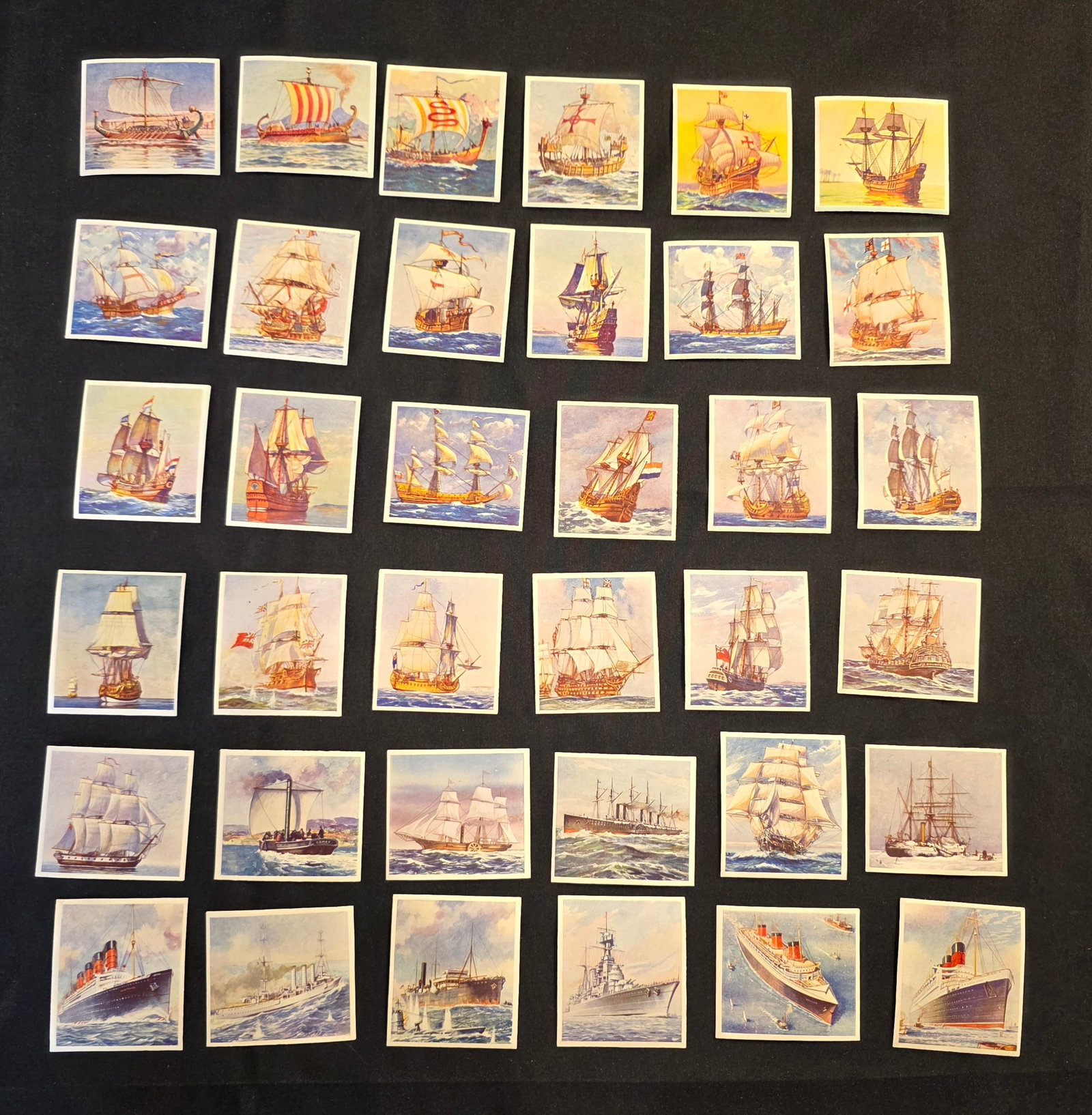 Ships That Made History Cigarette Cards: Full Set 1-36 of Godphrey Phillips Limited. Includes ungraded Titanic. Date: 1930s. 50% of all proceeds from the sale of this lot will be donated to the Raise Your Banner Foundation, a Washington DC