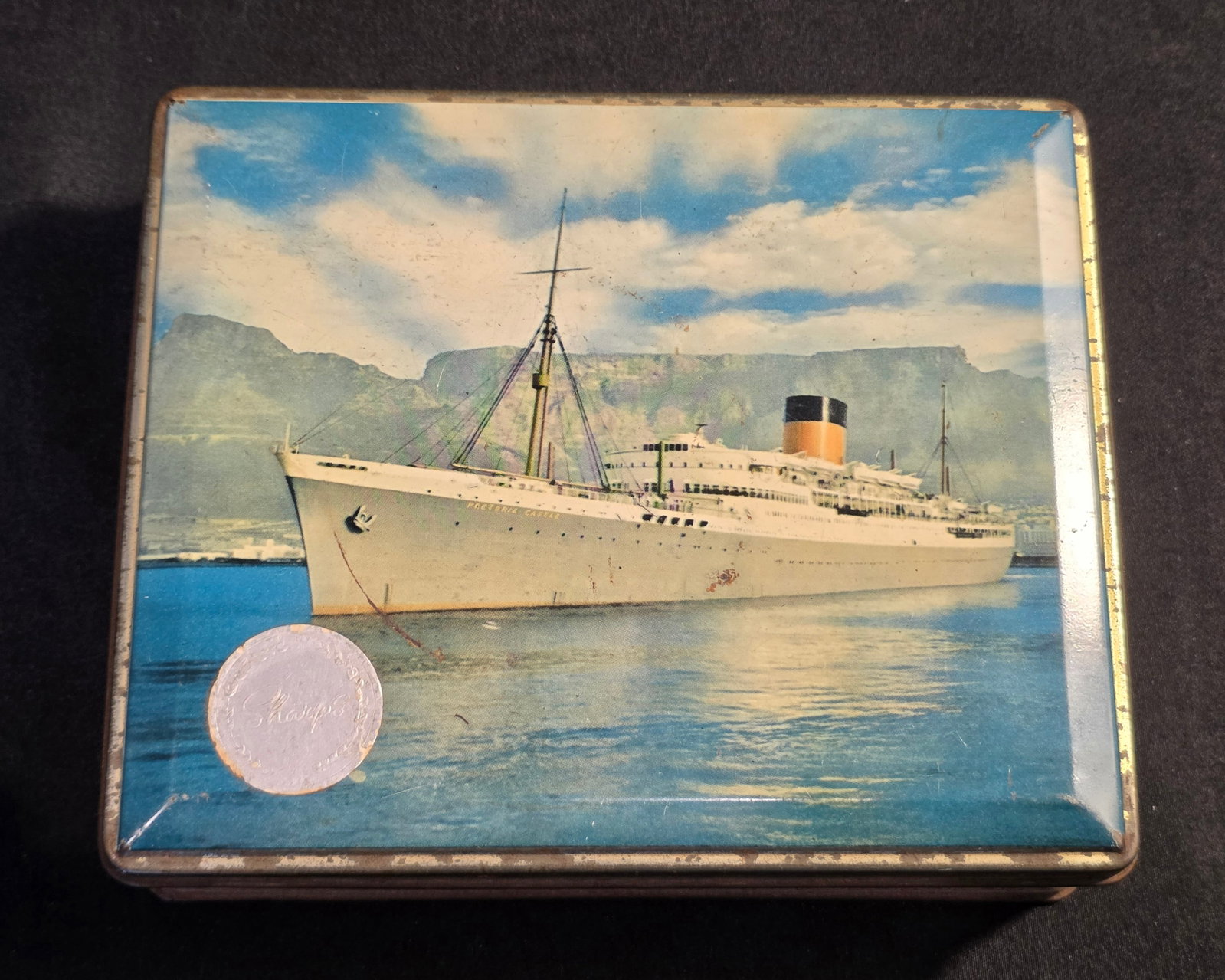 Union Castle Line R.M.M.V. Pretoria Castle Candy Tin: Edward Sharp of South Africa, date: 1940s+. 50% of all proceeds from the sale of this lot will be donated to the Raise Your Banner Foundation, a Washington DC based non-profit whose mission is to