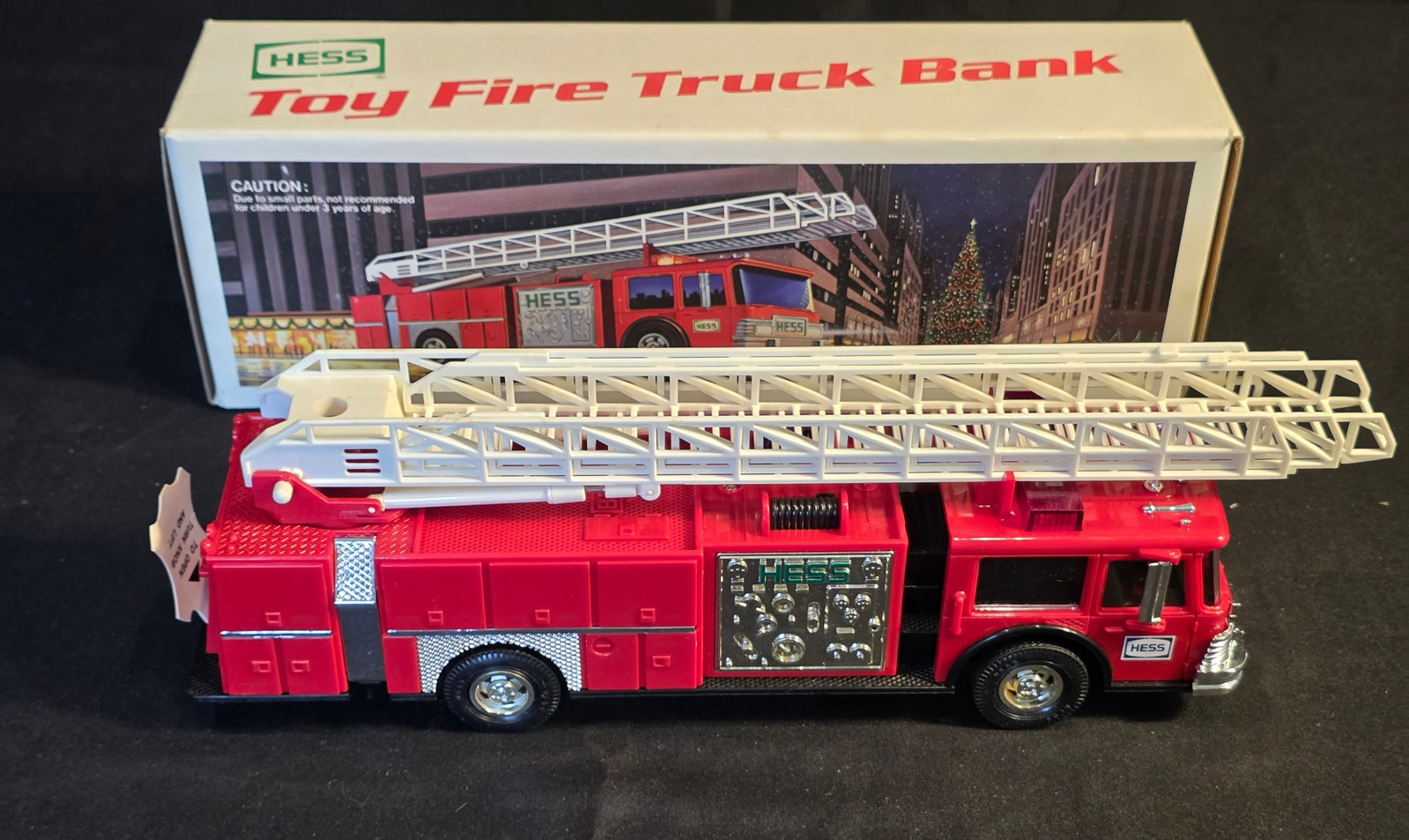 Hess Fire Truck: 1986. Original Box, untested. 50% of all proceeds from the sale of this lot will be donated to the Raise Your Banner Foundation, a Washington DC based non-profit whose mission is to break down the