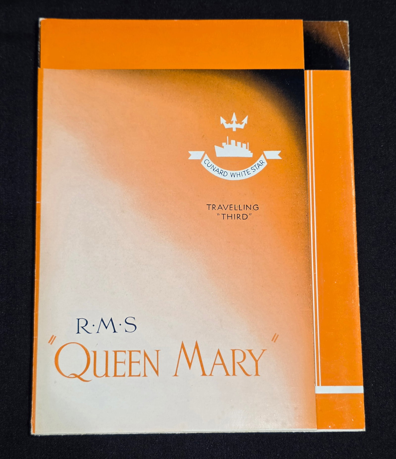 R.M.S. Queen Mary Traveling Third Guide: Guide for traveling third class from 1934-1949. 50% of all proceeds from the sale of this lot will be donated to the Raise Your Banner Foundation, a Washington DC based non-profit whose mission is to