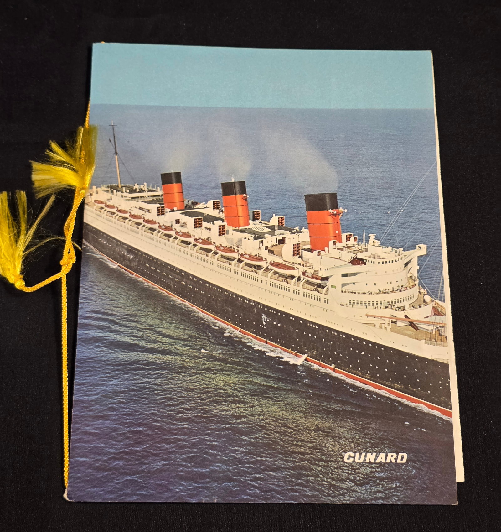 R.M.S. Queen Mary Farewell Salute Dinner Menu: At New York with the Travelers Aid Society of NY dated September 21st, 1967. 50% of all proceeds from the sale of this lot will be donated to the Raise Your Banner Foundation, a Washington DC based