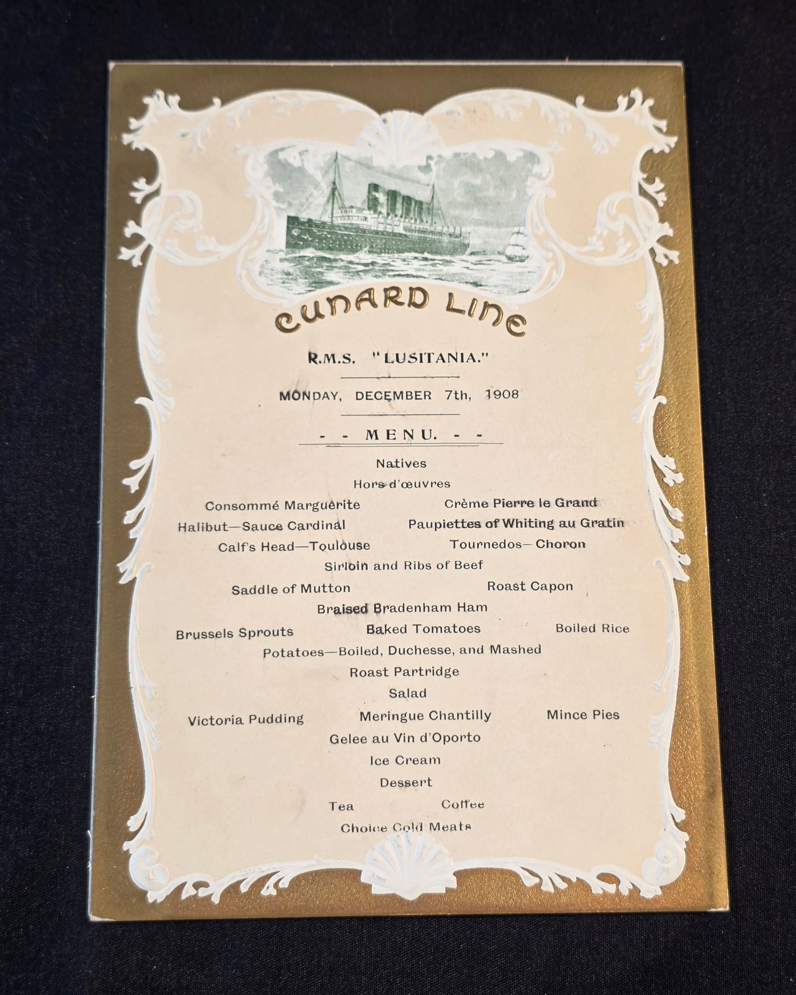 Cunard R.M.S. Lusitana First Class Dinner Menu: Dated December 7th, 1908. 50% of all proceeds from the sale of this lot will be donated to the Raise Your Banner Foundation, a Washington DC based non-profit whose mission is to break down the stigma 