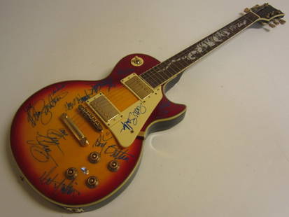 Bruce Springsteen+ Signed Guitar: This is an awesome item....a multi signed / autographed guitar with the following signatures on it: Bruce Springsteen. Members of the E Street Band: Clarence Clemons (D), Steven Van Zandt, Patti Scial