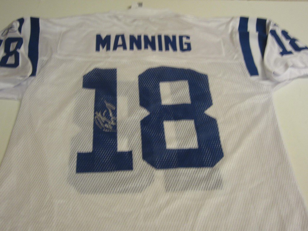 Peyton Manning Signed Jersey: Peyton Manning Indianapolis Colts signed / autographed football jersey size medium. The letters and numbers are printed on this jersey. It comes with a certificate of authenticity (COA)