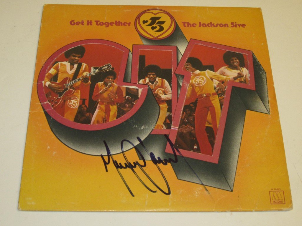 Michael Jackson Signed Album: Michael Jackson signed / autographed Jackson 5 "Get it together" album, this comes with a certificate of authenticity