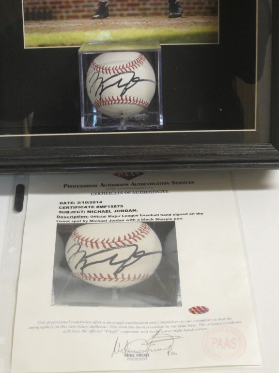 Michael Jordan Signed Baseball: Michael Jordan Chicago White Sox signed / autographed Official Major League Baseball on the sweet spot. This is built into a shadow box and comes with an 8x10 color photo. This has been certified by P