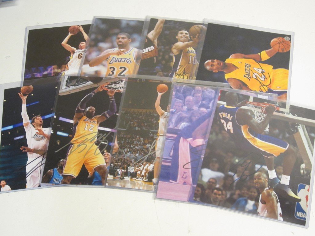 9 LA Lakers Signed Photos: Los Angeles Lakers Lot of 9 individually signed / autographed 8x10 color photos. Players included in this lot are as follow: Lamar Odom, Shaquille Oneal, Dwight Howard, Luke Walton, Pau Gasol, Kobe Br