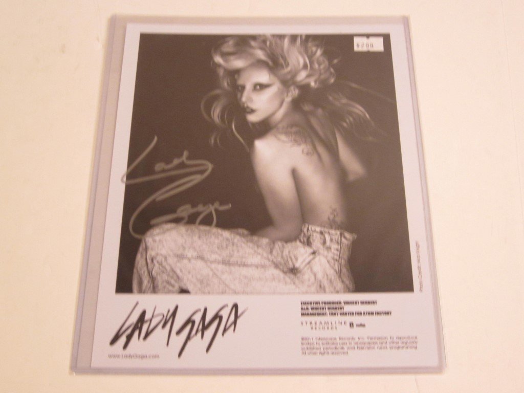 Lady Gaga Signed Promo Photo: Lady Gaga signed / autographed promotional black and white 8x10 photo. This comes with a certificate of authenticity