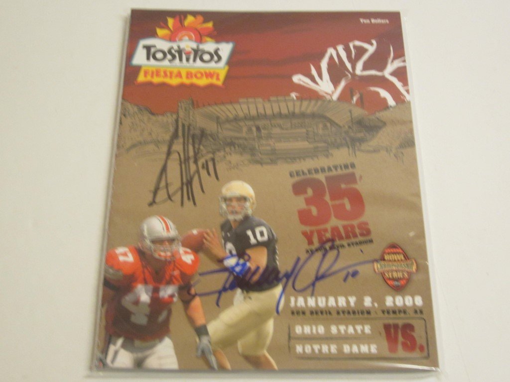 AJ Hawk/Quinn Signed Program: AJ Hawk and Brady Quinn dual signed / autographed Tostitos Fiesta Bowl Game Program, January 2, 2006. This comes with a coa