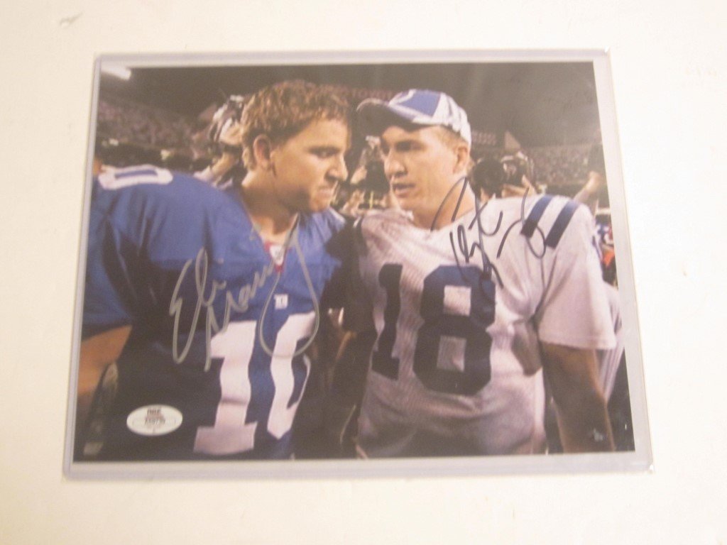 Peyton/Eli Manning signed photo: Peyton Manning Colts and Eli Manning Giants dual signed / autographed 8x10 color photo, this comes with a coa