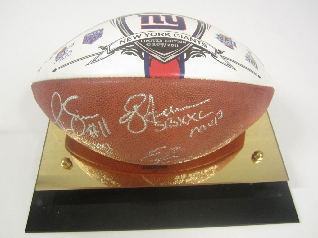 2011 NY Giants signed football: 2011 New York Giants multi hand signed Limited Edition full size football numbered 209/2011.This was signed by Phil Simms Eli Manning and Ottis Anderson. These were all super bowl MVPs for the Giant