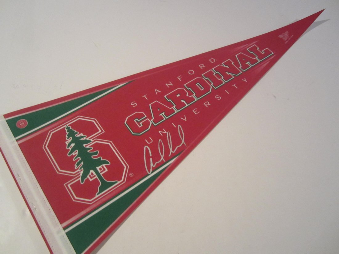 Andrew Luck signed pennant: This is a hand signed / autographed team pennant by Andrew Luck of the Stanford Cardinals. This has been authenticated and certified and comes with a Certificate of Authenticity by Ultimate Authenti