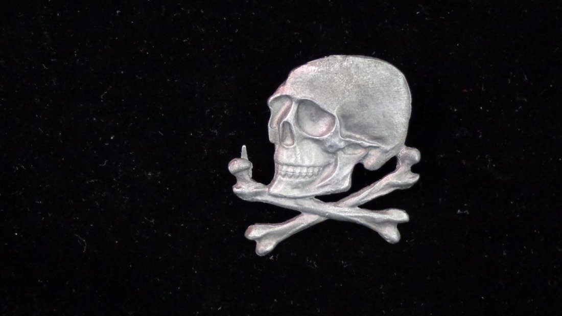 Skull and Cross Bones Pin: Approx. 1.5 inches wide.