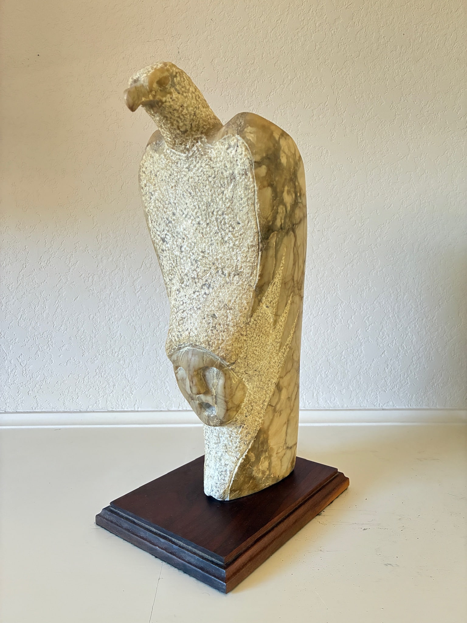 Eagle and Man Stone Carving: Height: 15" Depth: 8" Width: 6" Unsigned.