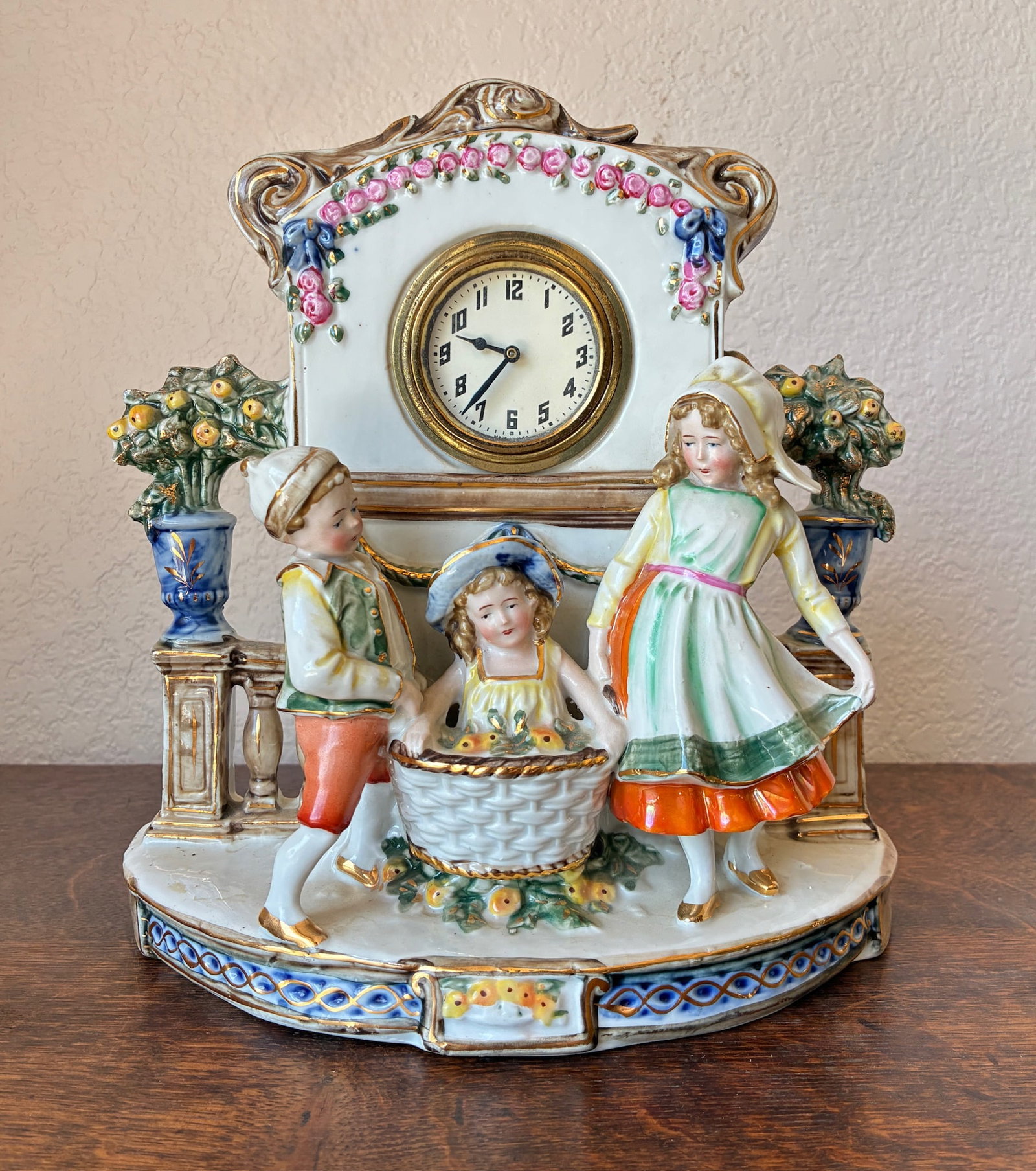 Decorative German Porcelain Mantle Clock: 9" x 4.25" x 9.75"