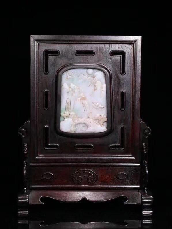 ZITAN MOUNTAIN LANDSCAPE TABLE SCREEN: Dimensions: 11 3/4 x 9 in; weight 1006 g This zitan mountain landscape table screen presents a refined scholarly elegance through its harmonious combination of hardwood craftsmanship and pictorial