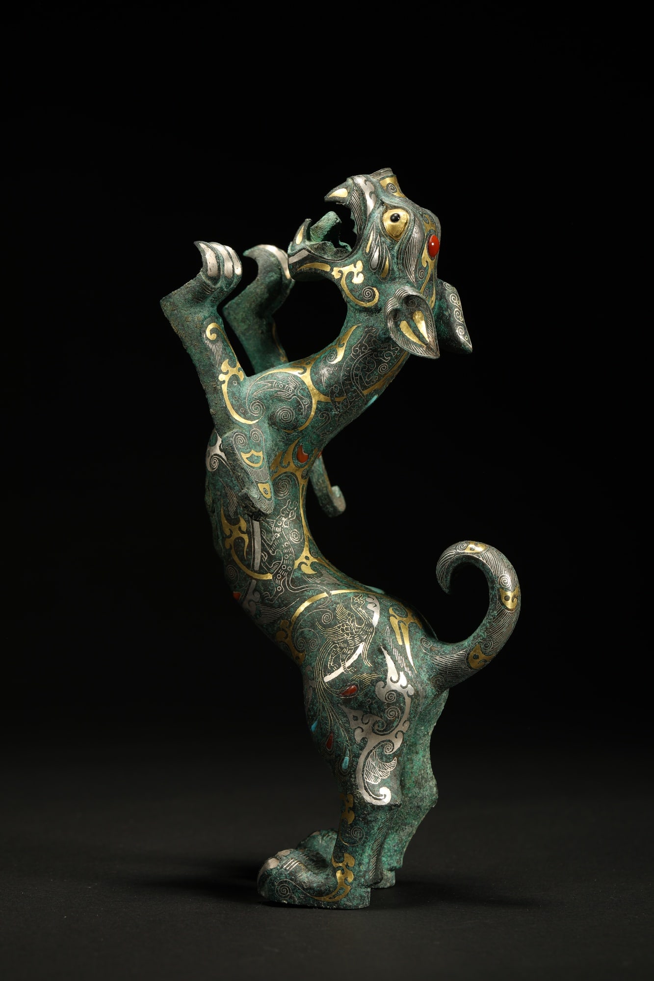 BRONZE GILT-SILVER TIGER: Dimensions: 8 5/8 in; weight 1252 g This bronze gilt-silver tiger sculpture presents a dynamic sculptural interpretation of strength and vitality through expressive modeling and intricate metalwork de