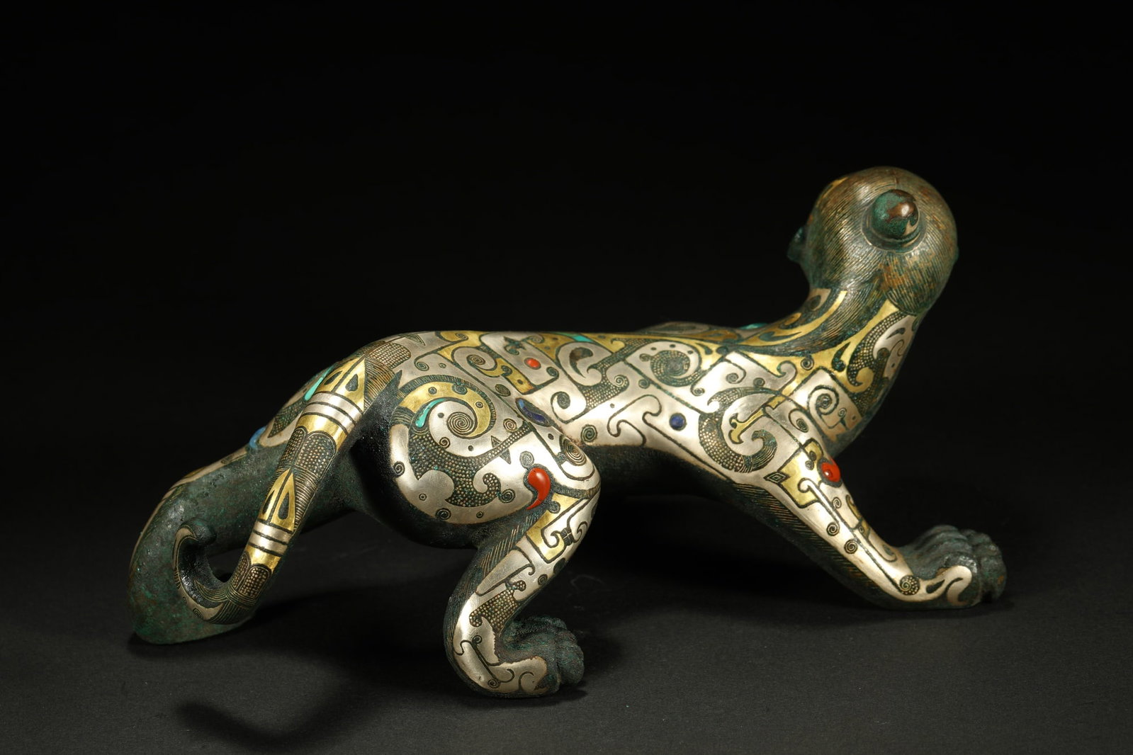 BRONZE GILT-SILVER HUMAN-FACED BEAST - 6
