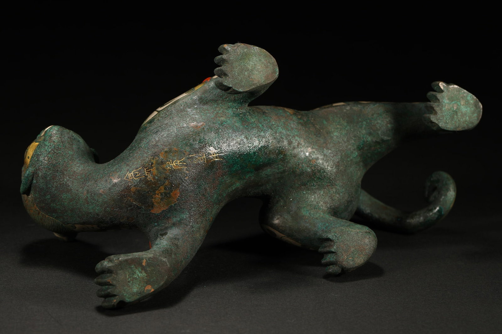 BRONZE GILT-SILVER HUMAN-FACED BEAST - 7