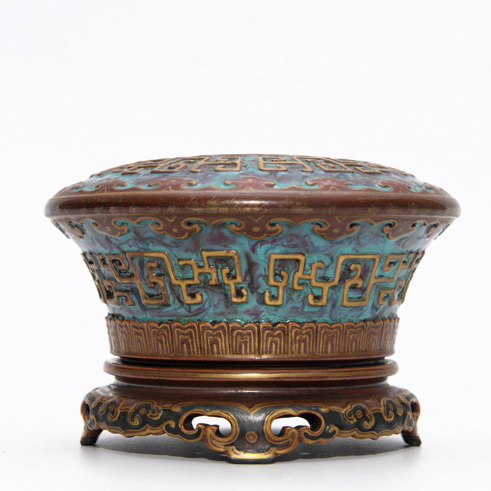 QIANLONG BRONZE-GROUND ENAMELLED CENSER: Dimensions: 3 1/8 x 4 3/8 in This Qianlong bronze-ground enamelled censer combines archaic inspiration with richly decorative porcelain craftsmanship. The compressed body and broad mouth create a