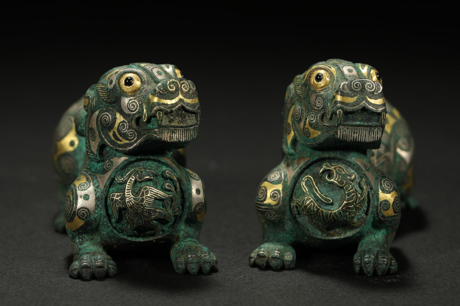 BRONZE GILT-SILVER MYTHICAL BEASTS, A PAIR - 4