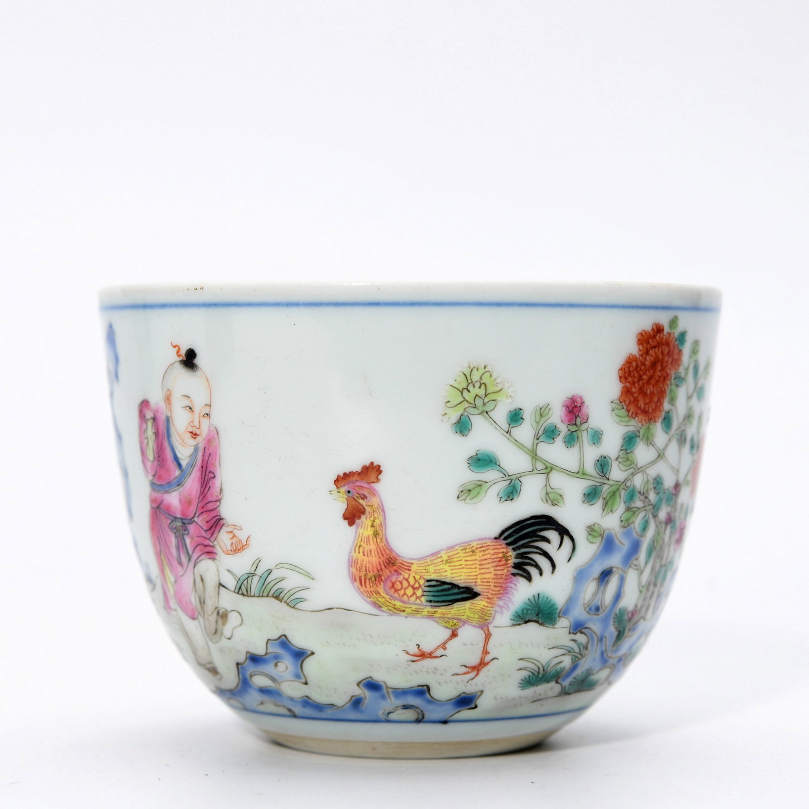 QIANLONG FAMILLE ROSE ROOSTER CUP: Dimensions: 2 1/4 x 3 1/8 in This Qianlong famille rose rooster cup presents a charming and lively decorative composition enriched by delicate enamel colours and naturalistic imagery. The exterior is