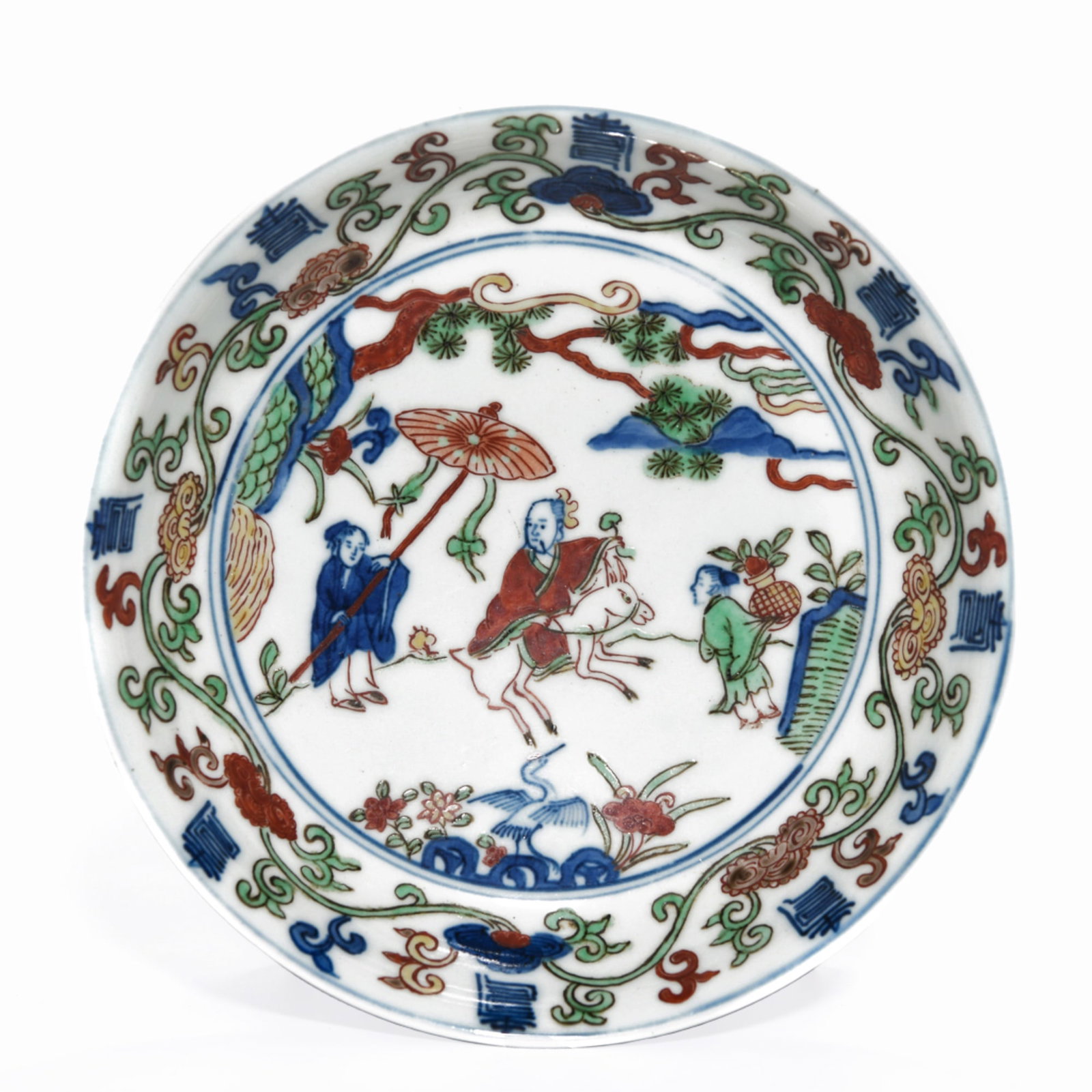A WANLI PERIOD WUCAI 'FIGURAL' DISH: Dimensions: 1 1/4 x 6 7/8 in A Chinese porcelain dish decorated in wucai enamels with figural scenes within a patterned border. Dimensions: 1 5/16 x 6 7/8 in (3.3 x 17.6 cm).