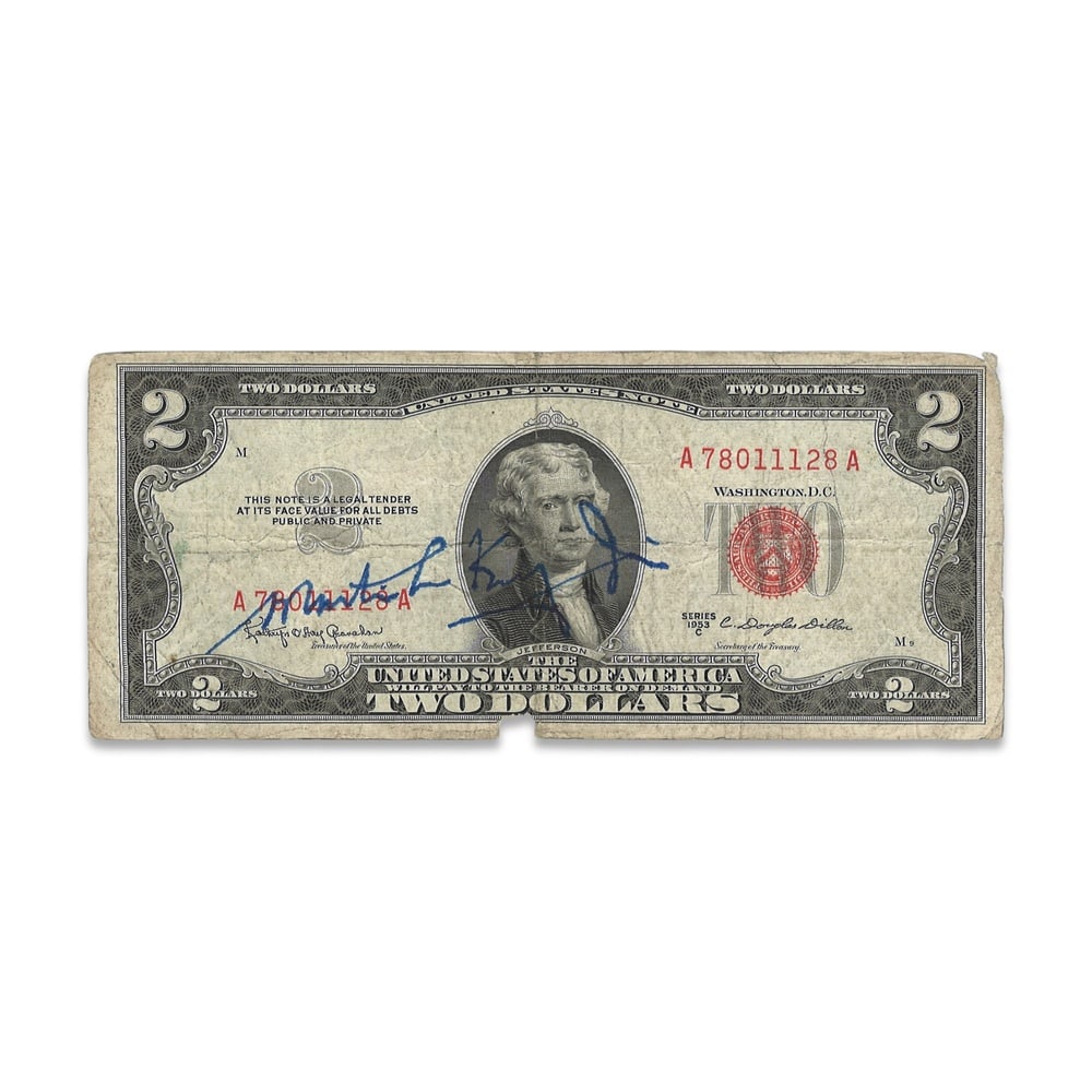 MARTIN LUTHER KING JR. SIGNED U.S. TWO DOLLAR NOTE: 6 1/8 x 2 1/2 in (15.5 x 6.5 cm) Provenance and Authentication: This collectible has undergone a rigorous forensic evaluation. The signatures were carefully analyzed across multiple criteria,