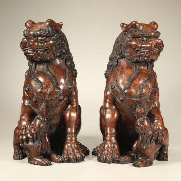 20th centuryPair of incense wood carved mythical animal figurines (1 of 6)